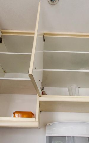 Apartamento à venda com 57m², 1 quarto e 1 vaga Apartamento à venda com 57m², 1 quarto e 1 vagaArmários da cozinha