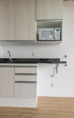 Studio para alugar com 35m², 1 quarto e 1 vaga Studio para alugar com 35m², 1 quarto e 1 vagaCozinha