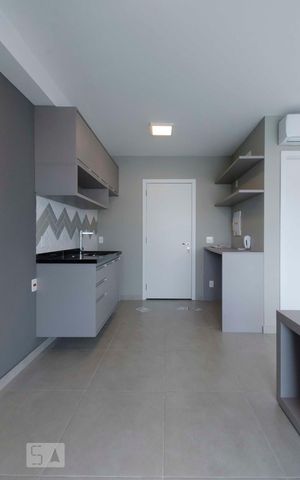 Studio à venda com 33m², 1 quarto e 1 vagaCozinha