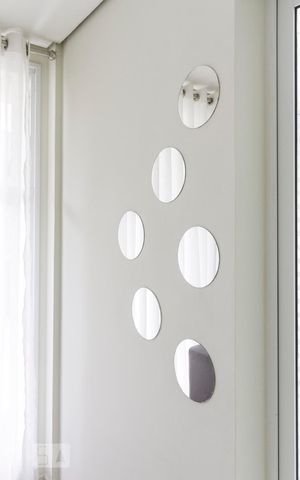 Apartamento à venda com 48m², 2 quartos e 1 vagaDetalhe de espelhos do hall social 