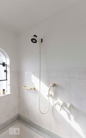 Casa à venda com 577m², 5 quartos e 7 vagasBanheiro Suíte 1