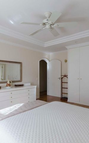Casa à venda com 577m², 5 quartos e 7 vagasSuíte 1