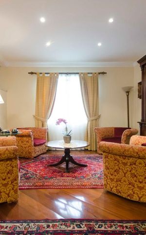 Casa à venda com 577m², 5 quartos e 7 vagasSala