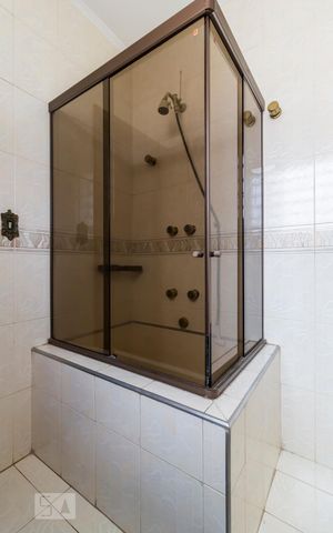 Casa à venda com 375m², 4 quartos e 2 vagasBanheiro suíte 2