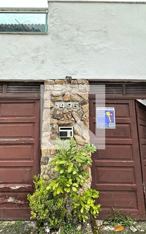 Casa à venda com 450m², 5 quartos e 3 vagasFachada com Plaquinha