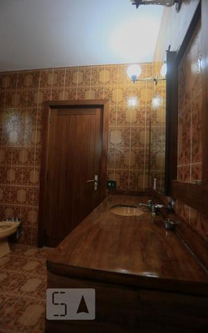 Casa à venda com 350m², 5 quartos e 4 vagasBanheiro Suite 