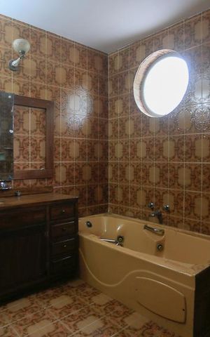 Casa à venda com 350m², 5 quartos e 4 vagasBanheiro Suite 