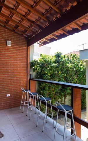 Casa para alugar com 200m², 4 quartos e 2 vagasÁrea externa Churrasqueira