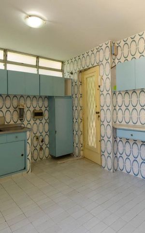 Casa à venda com 312m², 4 quartos e 2 vagasCozinha no terceiro pavimento