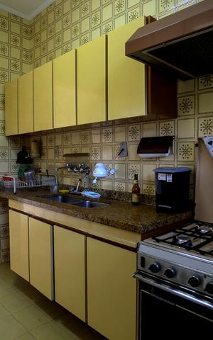 Casa à venda com 350m², 3 quartos e 4 vagas Casa à venda com 350m², 3 quartos e 4 vagasCozinha Armário