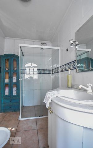 Casa à venda com 106m², 3 quartos e 2 vagas Casa à venda com 106m², 3 quartos e 2 vagasBanheiro Suíte 01
