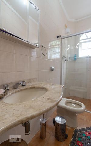 Casa de condomínio à venda com 430m², 4 quartos e 4 vagasBanheiro Suíte 3