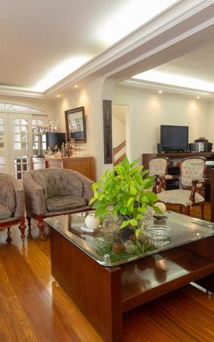 Casa de condomínio à venda com 430m², 4 quartos e 4 vagasSala