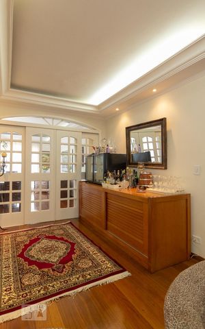 Casa de condomínio à venda com 430m², 4 quartos e 4 vagasSala