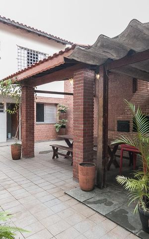 Casa à venda com 400m², 7 quartos e 4 vagasQuintal dos fundos 