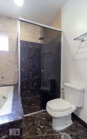 Casa de condomínio à venda com 260m², 4 quartos e 4 vagasBanheiro - Suíte 2