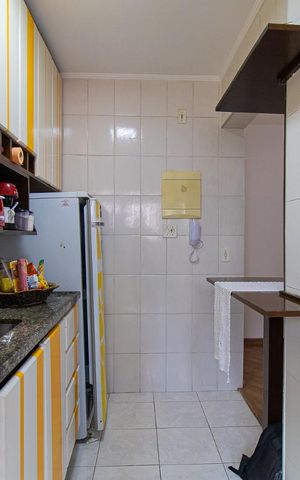 Apartamento à venda com 48m², 2 quartos e 1 vaga Apartamento à venda com 48m², 2 quartos e 1 vagaCozinha