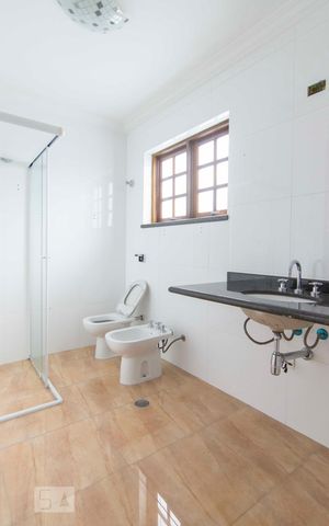 Casa à venda com 342m², 5 quartos e 5 vagasBanheiro Suíte 3