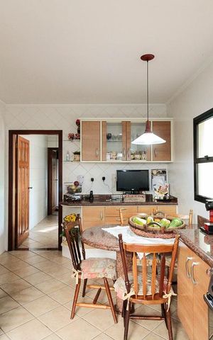 Casa à venda com 400m², 4 quartos e 4 vagas Casa à venda com 400m², 4 quartos e 4 vagasCozinha