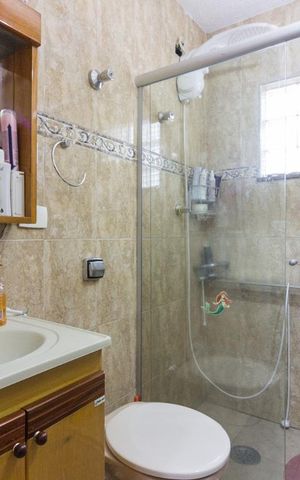 Casa à venda com 350m², 3 quartos e 2 vagasBanheiro Suite 2