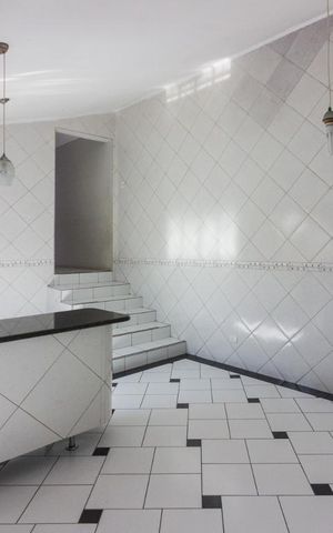 Casa para alugar com 200m², 2 quartos e 2 vagasCozinha