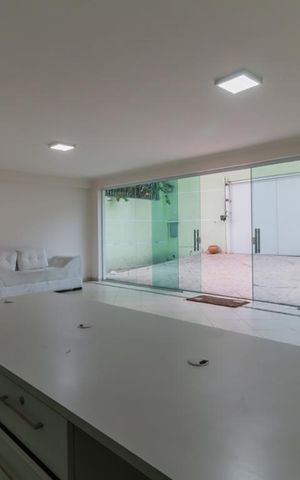 Casa à venda com 400m², 4 quartos e 5 vagas Casa à venda com 400m², 4 quartos e 5 vagasGaragem