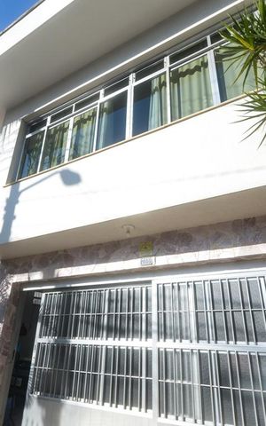 Casa à venda com 300m², 3 quartos e 5 vagas Casa à venda com 300m², 3 quartos e 5 vagasFachada