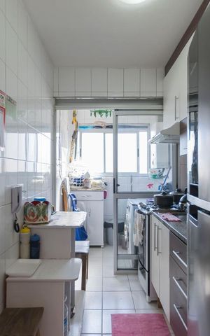 Apartamento à venda com 65m², 3 quartos e 2 vagasCozinha