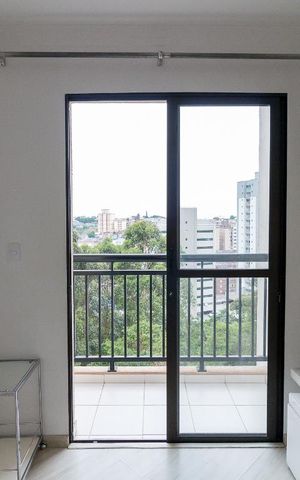 Apartamento à venda com 50m², 2 quartos e 1 vagaSala - porta da varanda