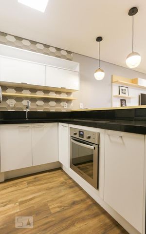 Apartamento à venda com 57m², 1 quarto e 1 vaga Apartamento à venda com 57m², 1 quarto e 1 vagaCozinha