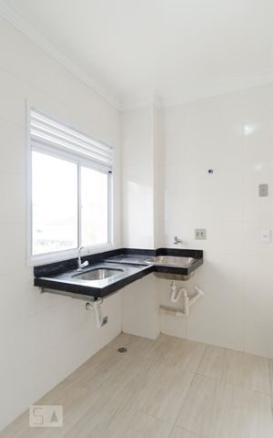 Apartamento para alugar com 52m², 2 quartos e 2 vagas Apartamento para alugar com 52m², 2 quartos e 2 vagasCozinha e área de serviço