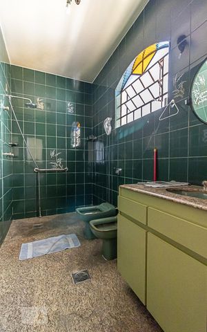 Casa à venda com 386m², 3 quartos e 8 vagas Casa à venda com 386m², 3 quartos e 8 vagasBanheiro da Suíte