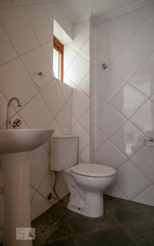 Casa à venda com 216m², 4 quartos e 3 vagas Casa à venda com 216m², 4 quartos e 3 vagasLavabo / 1º pavimento