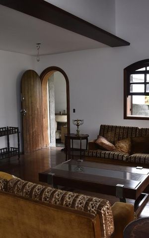 Casa de condomínio para alugar com 450m², 4 quartos e 2 vagasSala
