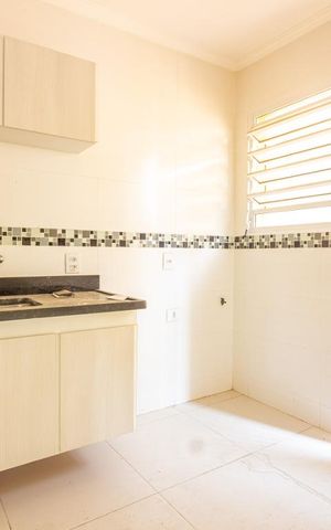 Casa à venda com 300m², 4 quartos e 4 vagas Casa à venda com 300m², 4 quartos e 4 vagasCozinha