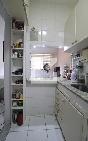 Apartamento à venda com 52m², 2 quartos e sem vaga Apartamento à venda com 52m², 2 quartos e sem vagaCozinha e Área de Serviço