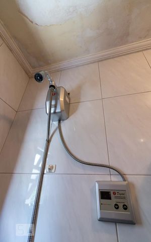 Casa à venda com 159m², 3 quartos e 4 vagasChuveiro banheiro social 1