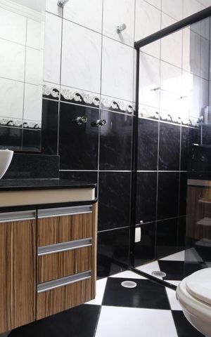 Casa à venda com 255m², 4 quartos e 4 vagas Casa à venda com 255m², 4 quartos e 4 vagasBanheiro da Suíte