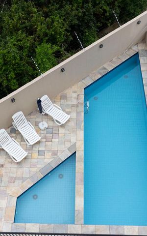 Apartamento à venda com 57m², 2 quartos e 1 vagavista quarto 2 piscina