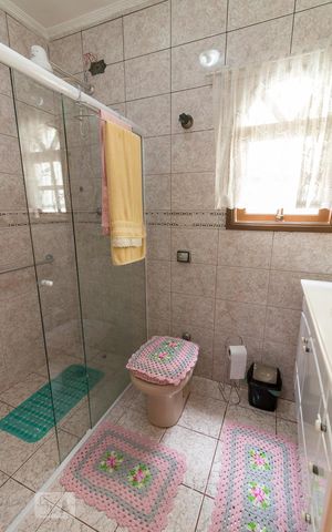 Casa à venda com 198m², 3 quartos e 2 vagasBanheiro quarto 1 suíte