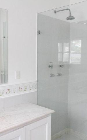 Casa à venda com 400m², 4 quartos e 2 vagas Casa à venda com 400m², 4 quartos e 2 vagasBanheiro Social - 3º Andar
