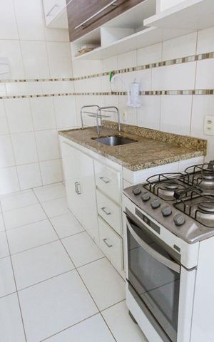 Apartamento à venda com 50m², 2 quartos e 1 vaga Apartamento à venda com 50m², 2 quartos e 1 vagaCozinha e Área de Serviço