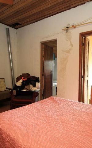 Casa de condomínio à venda com 250m², 6 quartos e 1 vagaDormitorio 1