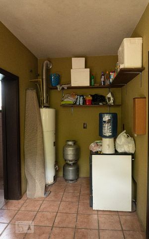Casa à venda com 442m², 5 quartos e 4 vagasLavanderia