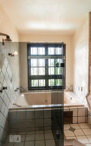 Casa à venda com 442m², 5 quartos e 4 vagasBanheiro3