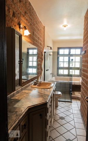 Casa à venda com 442m², 5 quartos e 4 vagasBanheiro 3