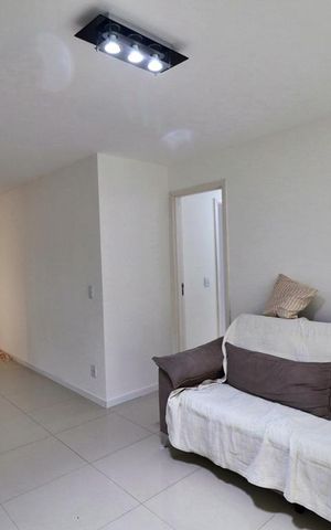 Casa de condomínio à venda com 165m², 3 quartos e 2 vagasSala