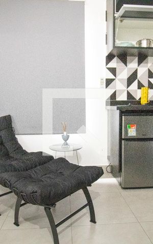 Apartamento para alugar com 53m², 1 quarto e 1 vagaSala-detalhe poltrona 