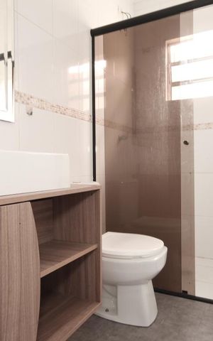 Casa à venda com 130m², 3 quartos e 2 vagasBanheiro