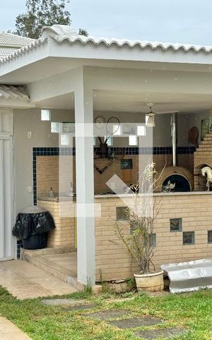 Casa de condomínio à venda com 296m², 4 quartos e 3 vagas Casa de condomínio à venda com 296m², 4 quartos e 3 vagasÁrea externa